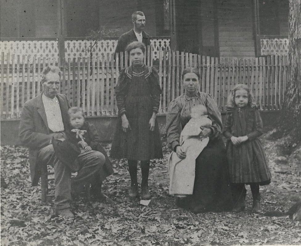 John and Allie (2nd wife) Howell Family - Ramer, Alabama. L to R: John, Henry T., Eva Lee, Allie Valeria Adams Howell, Alabama (daughter, in arms), Johnnie Naomi, unknown man.